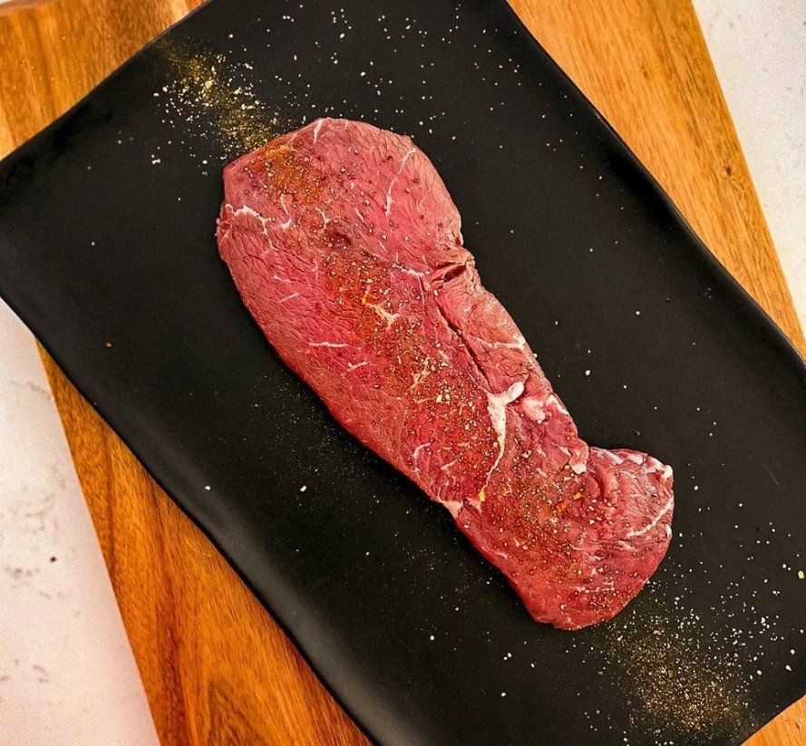 Tennessee Grass Fed sirloin steak seasoned and ready to grill