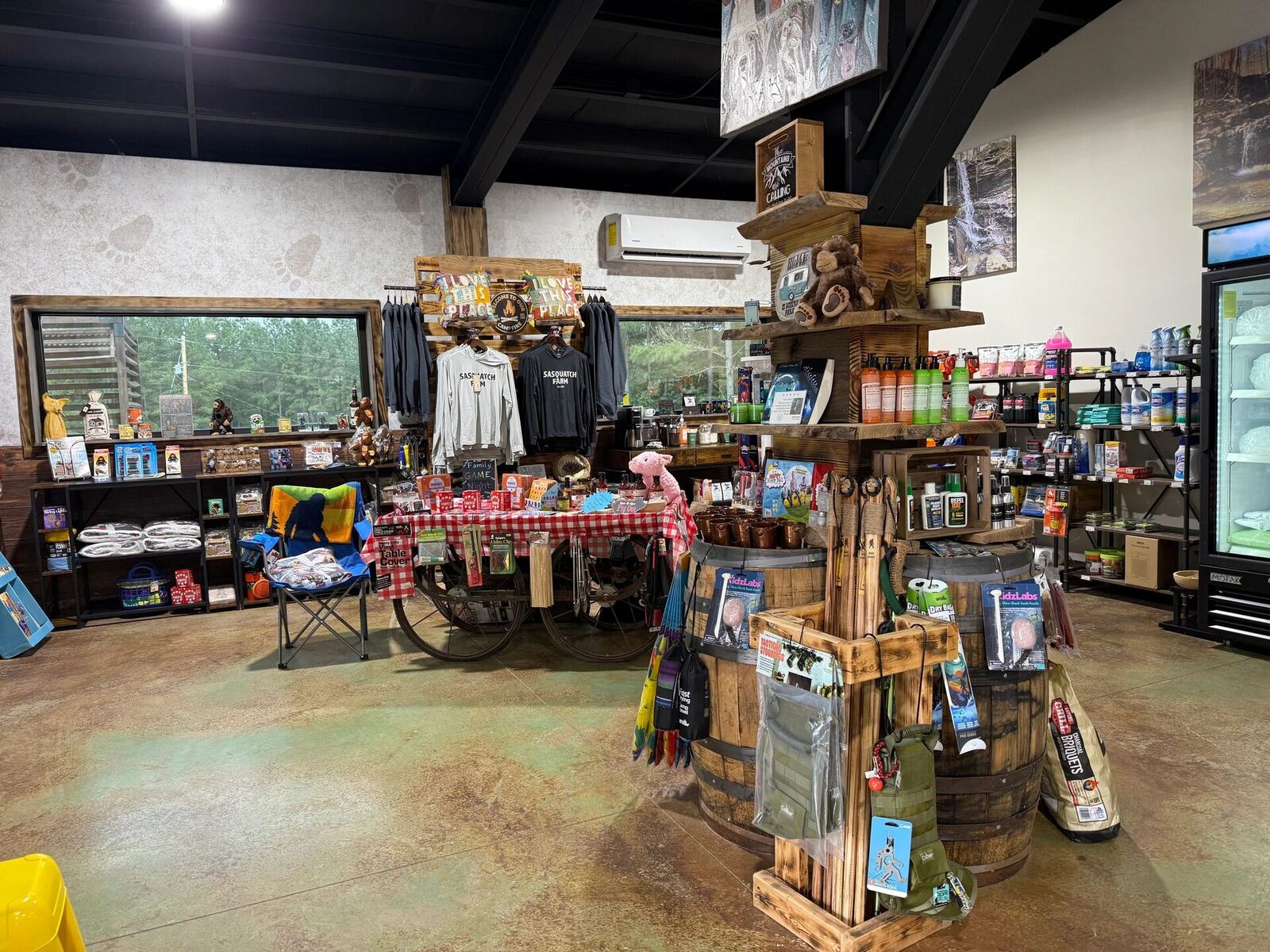 Snacks, drinks, and camping essentials on the shelves at Piggy's Store